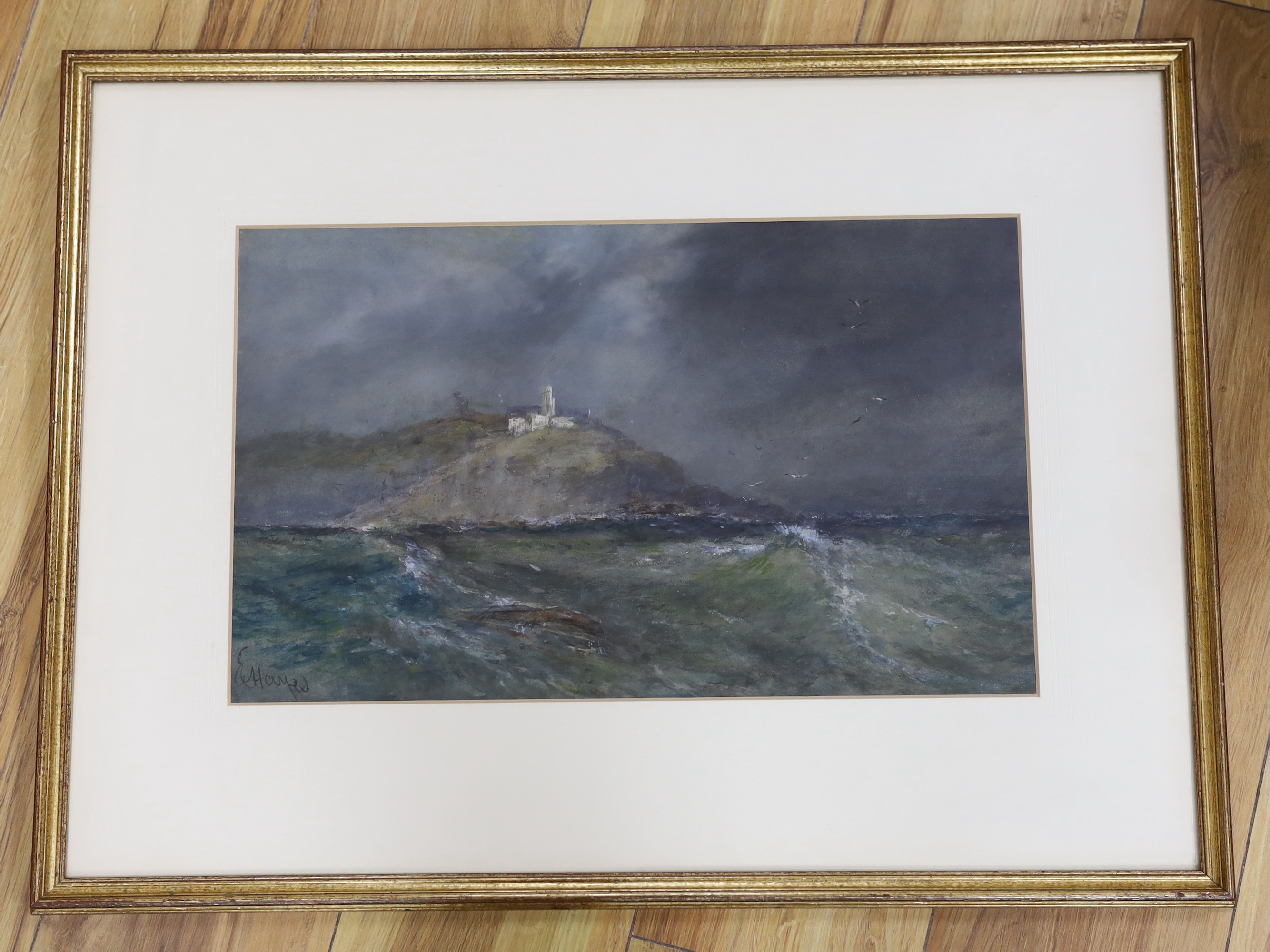 Edwin Hayes (1830-1904) heightened watercolour, Coastal landscape with castle ruins, signed, 27 x 44cm